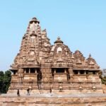 Khajuraho Tourist Attraction: खजुराहो में कहाँ घूमें, क्या खाएं और कहाँ रहे? क्या है मध्य प्रदेश के खजुराहो मंदिर का इतिहास? How to Reach Best Exotic Place Khajuraho?